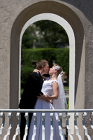 wedding portrait of bride and groom kissing